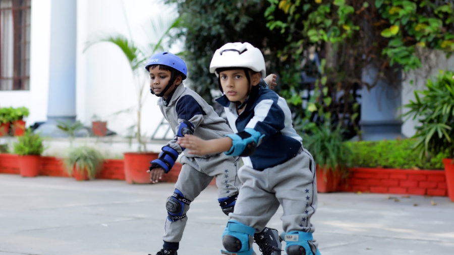 The Asian School students doing  Skating