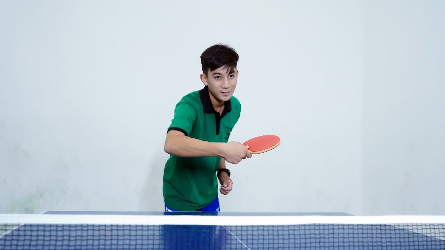 The Asian School student playing Table Tennis