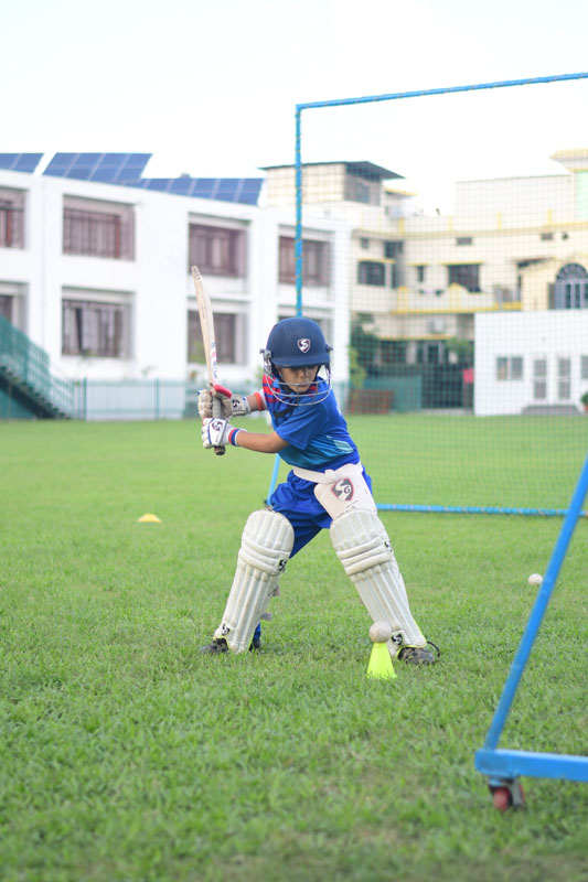 The Asian School School Student playing cricket 